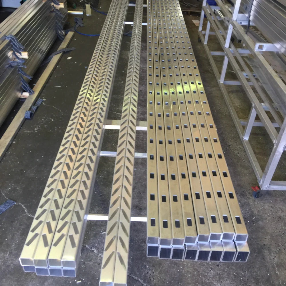 Straight and louvre slotting on CNC-routed aluminium profiles.
